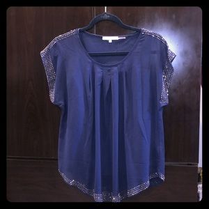 Dark blue blouse with stones.